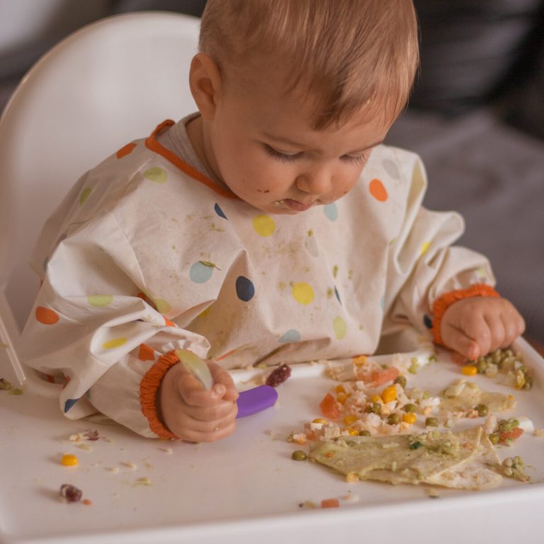 9 month old baby learns to eat